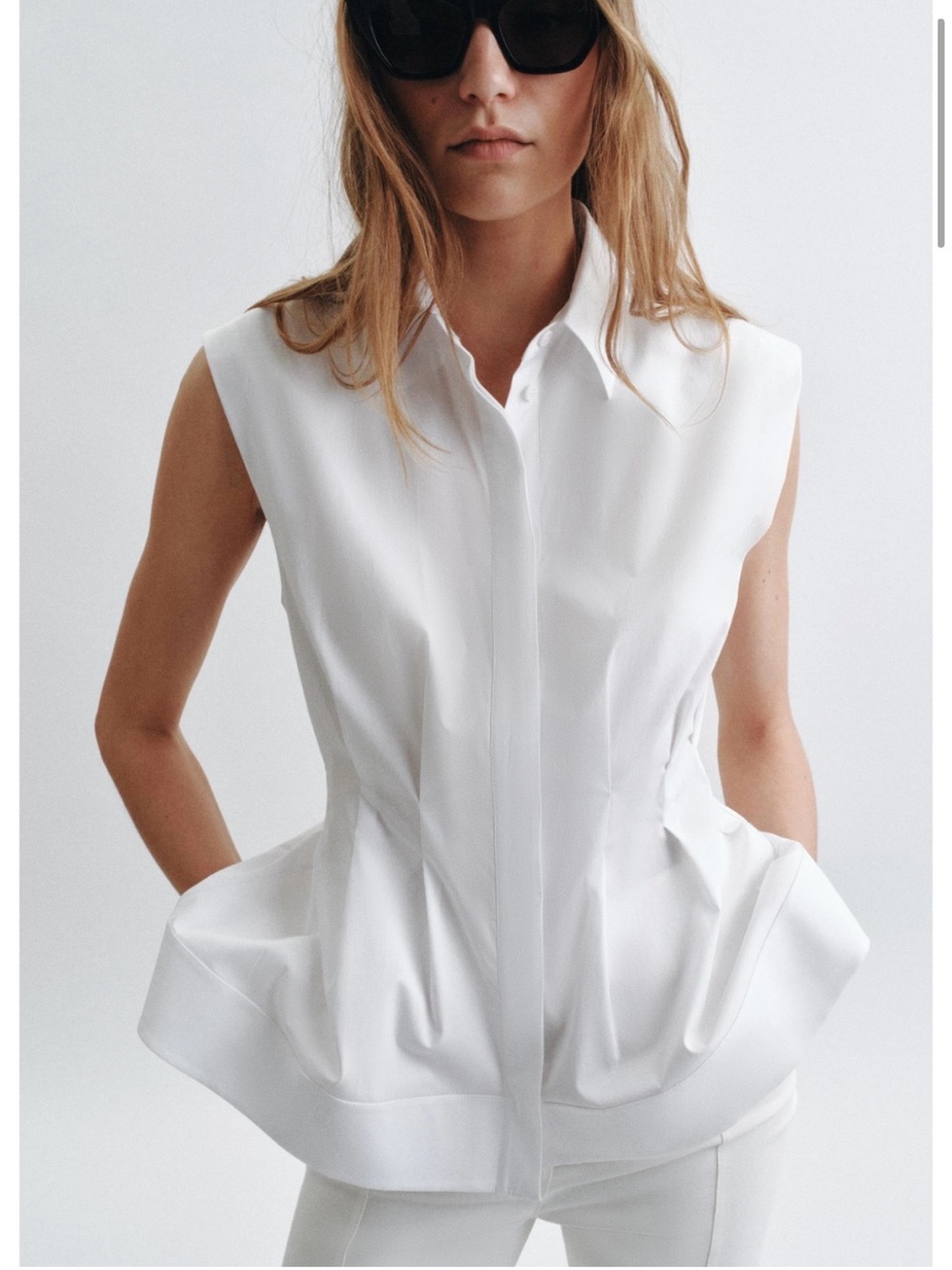 Zara Sleeveless White Peplum Button-Down Top